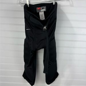 Nike Y2K youth team black padded & belted football game pants. Size Medium